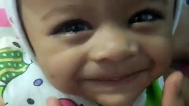 baby smile trick