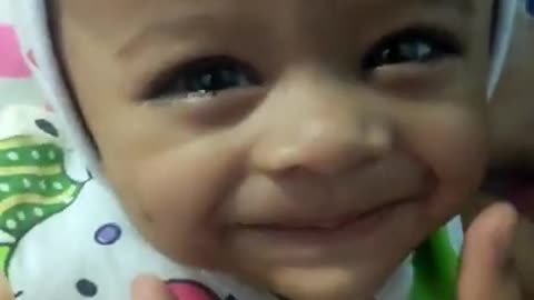 baby smile trick