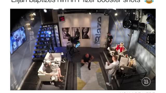 Alex Jones Pledges Allegiance to the NWO and Elijah baptizes him in Pfizer Booster shots