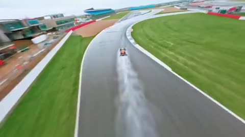 The world's fastest drone takes on an F1 car