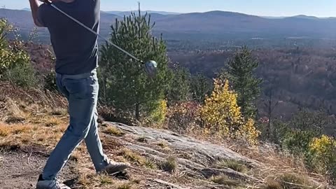 Hitting Golf Balls of a Mountain