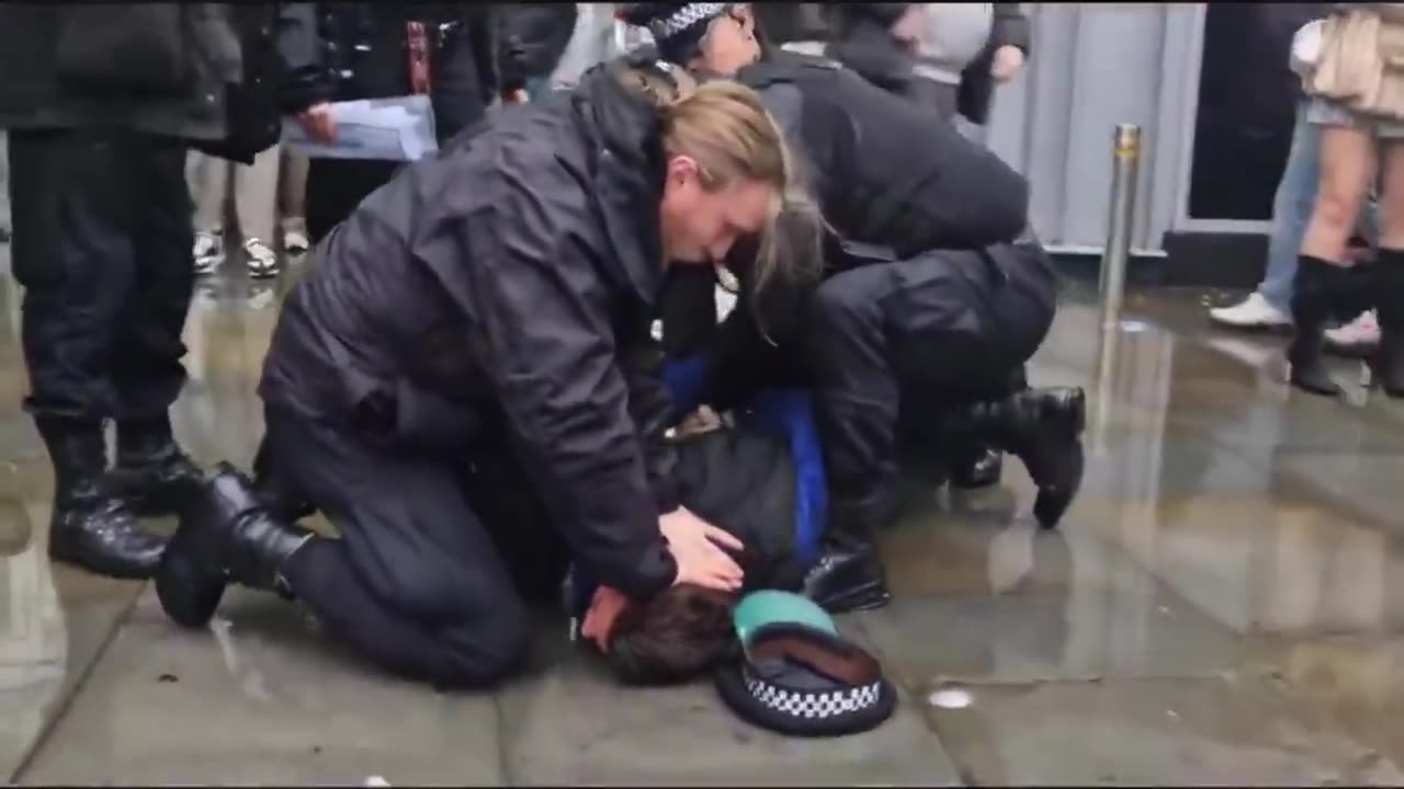 UK officers throw man to the floor while one repeatedly forces his head into the concrete