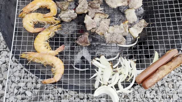 Deliciously cooked pork, shrimp, mushrooms and onions