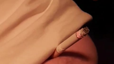 Nsfw guy smokes cigarette out of belly button