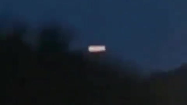 Cigar-shaped UFO seen on highway in United States 2021