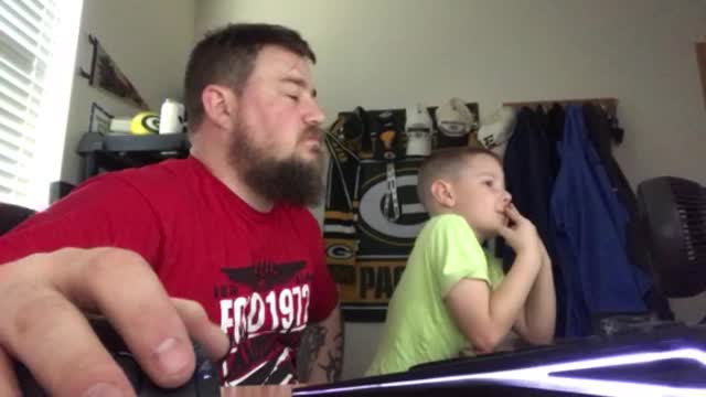 Father scares son with snake pop up scare