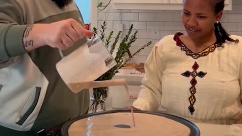 Husband tries making injera