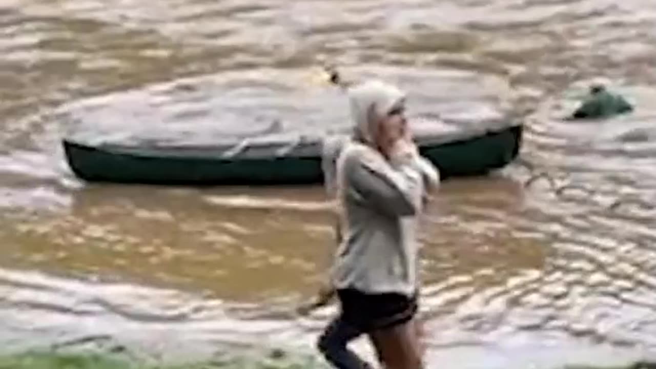 Heartstopping moment North Carolina man jumps into surging floodwaters after spotting woman trapped in debris