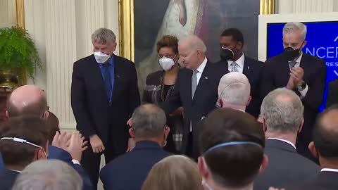 Maskless Biden going around shaking hands and breathing on people