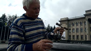 Man Rides Teeny Tiny Bicycle