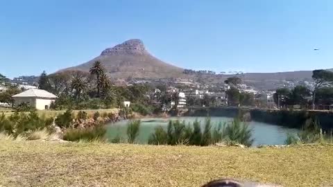 Helicopters collecting water at reservoir