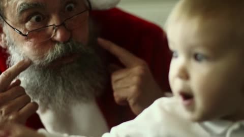 Santa Claus With A Baby