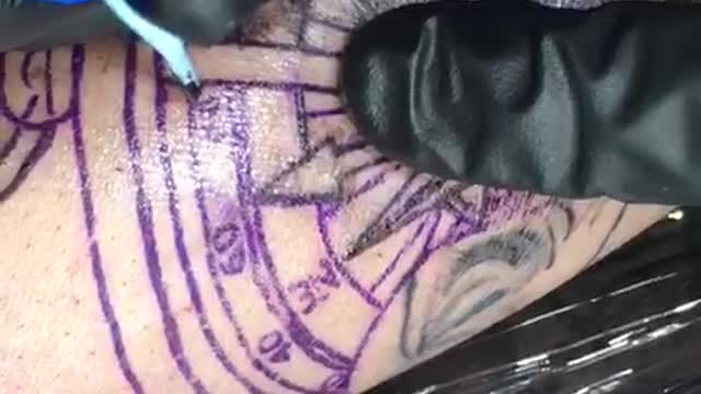 Brazilian artist tattooing in progress (real time)