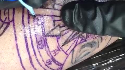 Brazilian artist tattooing in progress (real time)