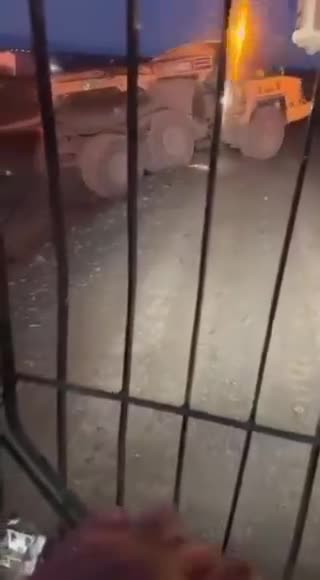 In Iceland workers building lava defensive wall