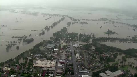 Australia evacuates thousands, faces record floods