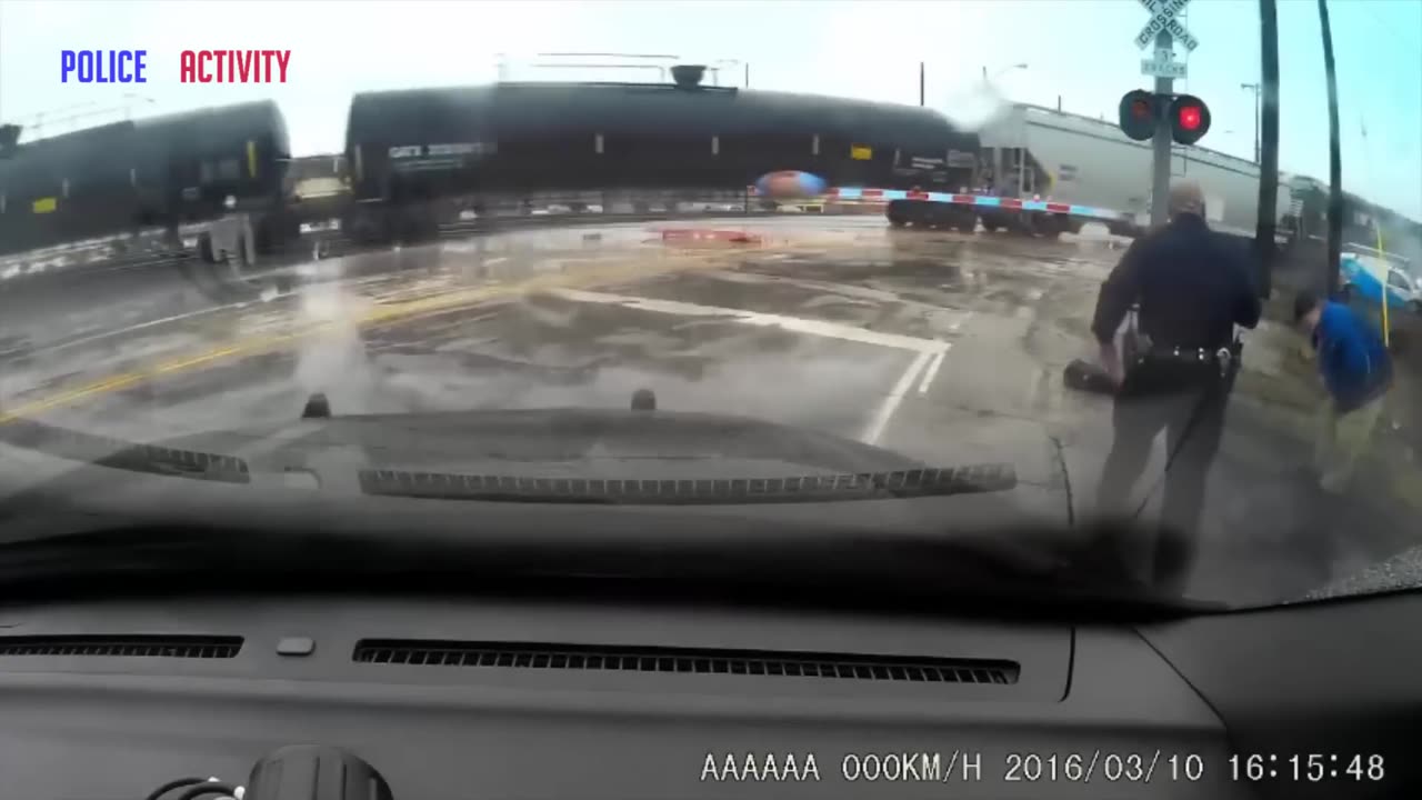 Police Dashcam Video Shows Train Smashing Into Van in Ohio