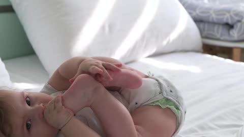 Parents' Guide to the Importance of Baby Reaching Hands to Feet