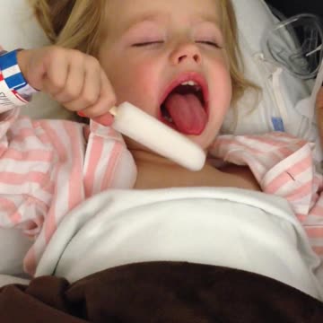 Little Girl Struggles To Eat Popsicle