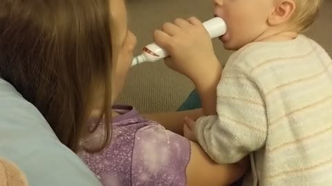 The baby and the power toothbrush