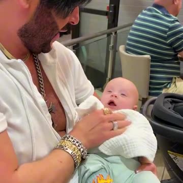 LGBT influencer films his surrogate baby for a TikTok video