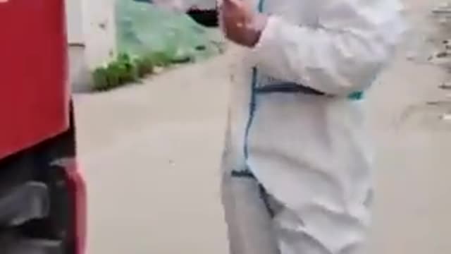 Giving a covid test to a truck