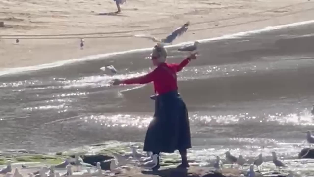 Woman Is One With the Birds