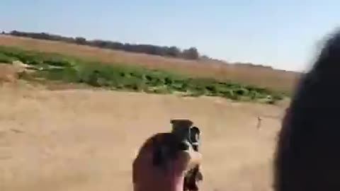 A CNN freelance Journalist carries a hand grenade at the Israeli border area during Hamas attack On Oct 7, 2023