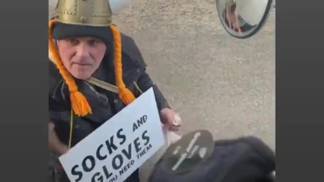 Canadians handing out fresh socks and gloves