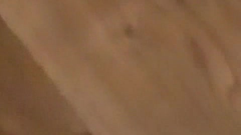 A baby boy is walking around with my phone and its silly