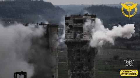 Ukrainian Drone Smashes a Russian Gun Emplacement High atop an Industrial Building