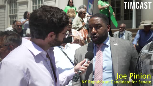 Rally for Bodega Worked Charged with Murder