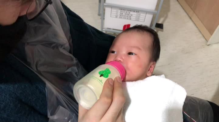 A stable breastfeeding position that will satisfy her