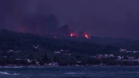 Greek firefighters battle overnight to contain blaze