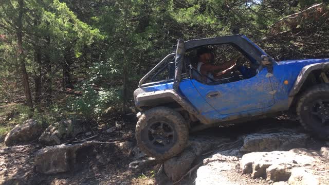 O'brien SXS climbing a rock ledge, Tuttle Creek ORV