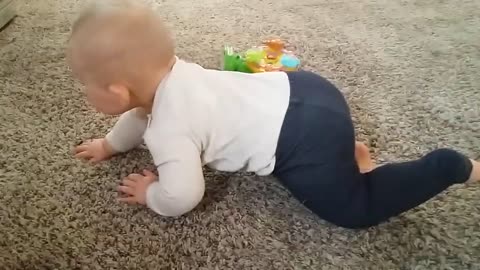 Baby Kid Playing on the Floor