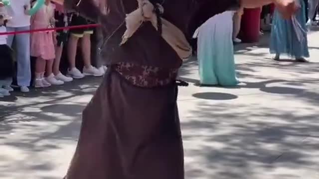 The uncle dances enchantingly, his eyes are so lethal.
