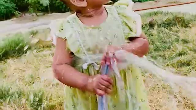 Cutest baby playing with water