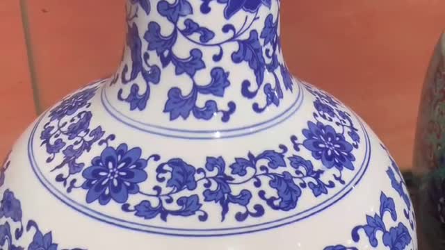 White and blue engraved jar