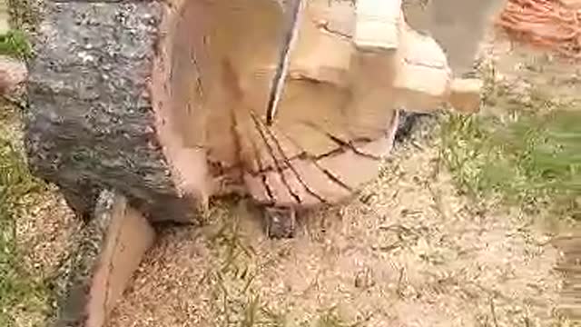 Me Carving a Cross for the Pastor of a Church I Camped Out Behind Following Hurricane Laura