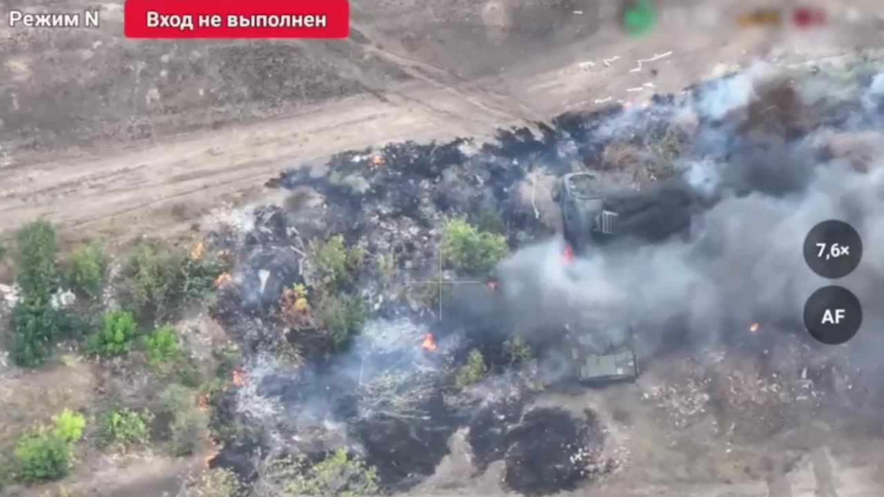 A Bradley burns next to a Ukrainian MRAP. Suddenly, the Kozak explodes