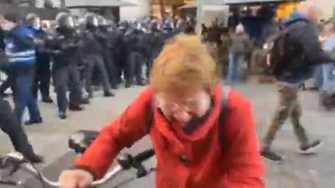 Merkel's minions spraying tear gas
