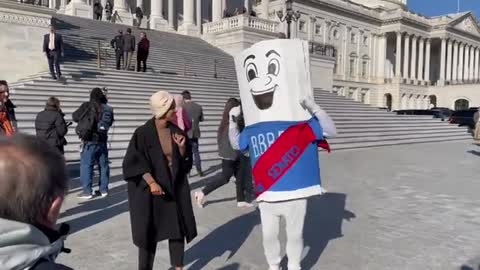 MUST WATCH: Delirious Democrat Dances in "Build Back Better Bill" Costume Outside of Capitol