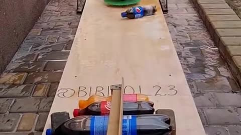 Cutting experiment with bottles juice and cold drinks