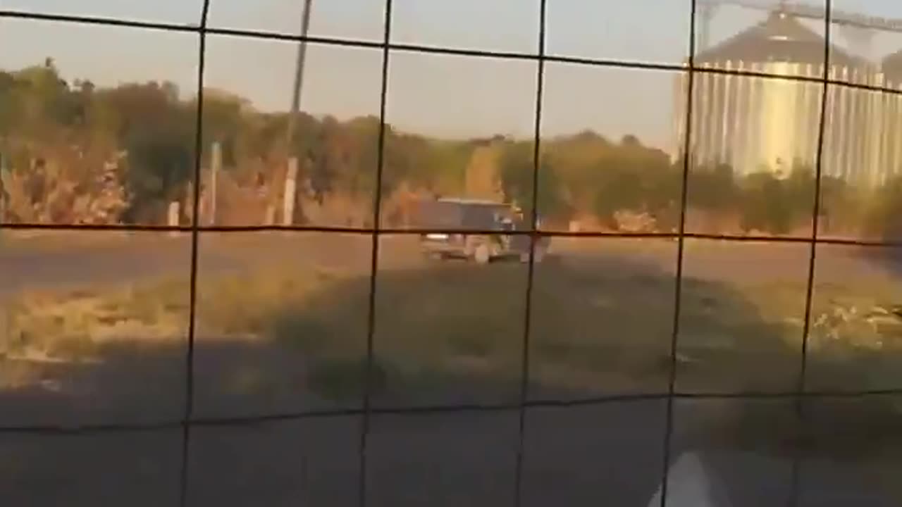 Russian soldiers in a car dodged a Ukrainian drone in the Kursk border area.