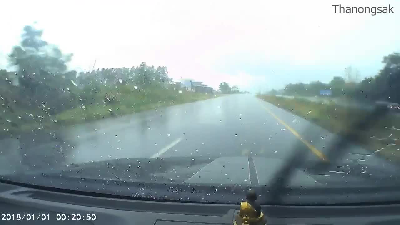 Speeding Truck Hydroplanes across Highway