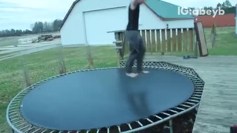 Guy attempts handstand then backflip on trampoline, falls off onto head