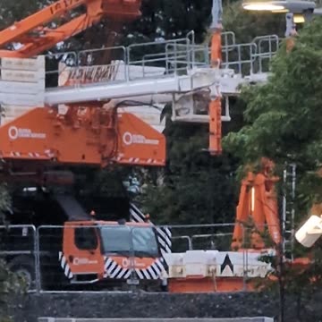 World's most powerful Mobile lattice boom Crane asleep among the trees