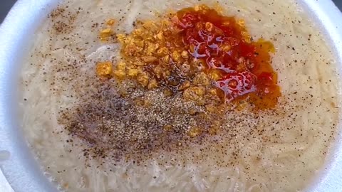 Delicious and Spicy Noodles with Meatballs: A Satisfying Meal Experience