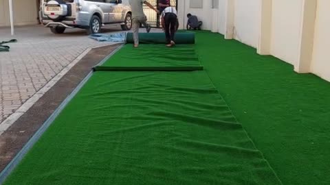 Artificial grass fixing